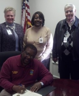 Center-Mayor Walter J. Mason (LtoR) Diane Laine& Darlene Walker, Members of Personal Care Preferred Group & John Thurman, CEO Personal Care Preferred Group